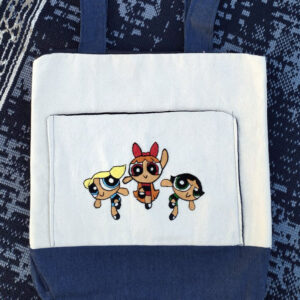 Happy Power Puff Girls Tote Bag with bright and cheerful design Close-up of happy Power Puff Girls embroidery on tote bag Colorful Happy Power Puff Girls canvas tote bag with sturdy handles