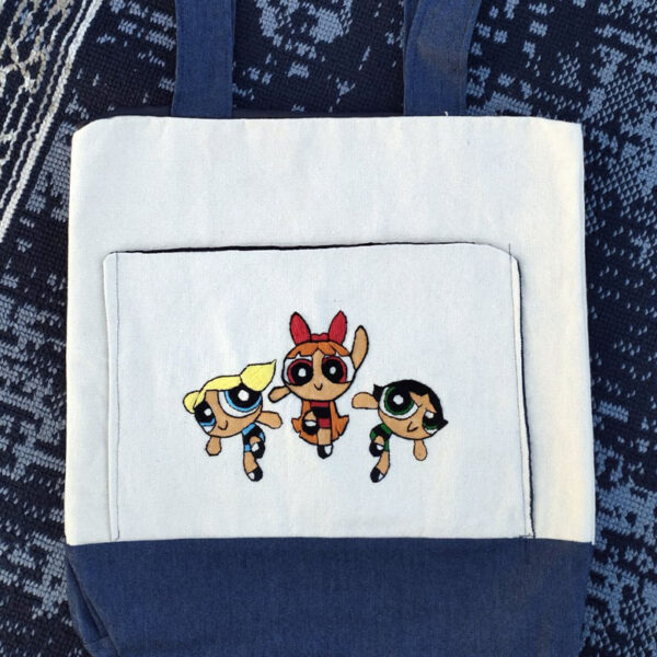 Happy Power Puff Girls Tote Bag with bright and cheerful design Close-up of happy Power Puff Girls embroidery on tote bag Colorful Happy Power Puff Girls canvas tote bag with sturdy handles